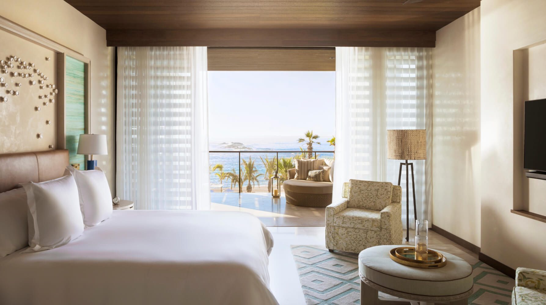 Modern Baja design villa interior at Chileno Bay Residences with floor-to-ceiling windows