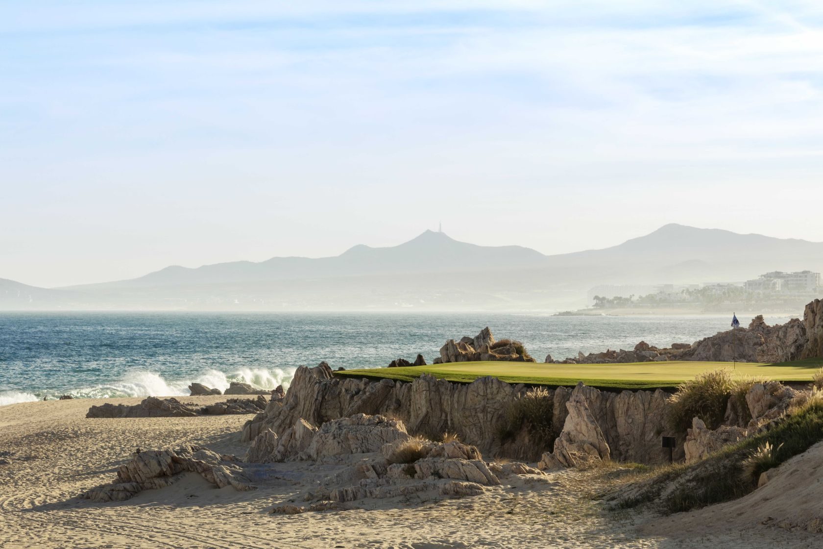 Luxury golf course in Los Cabos with ocean backdrop