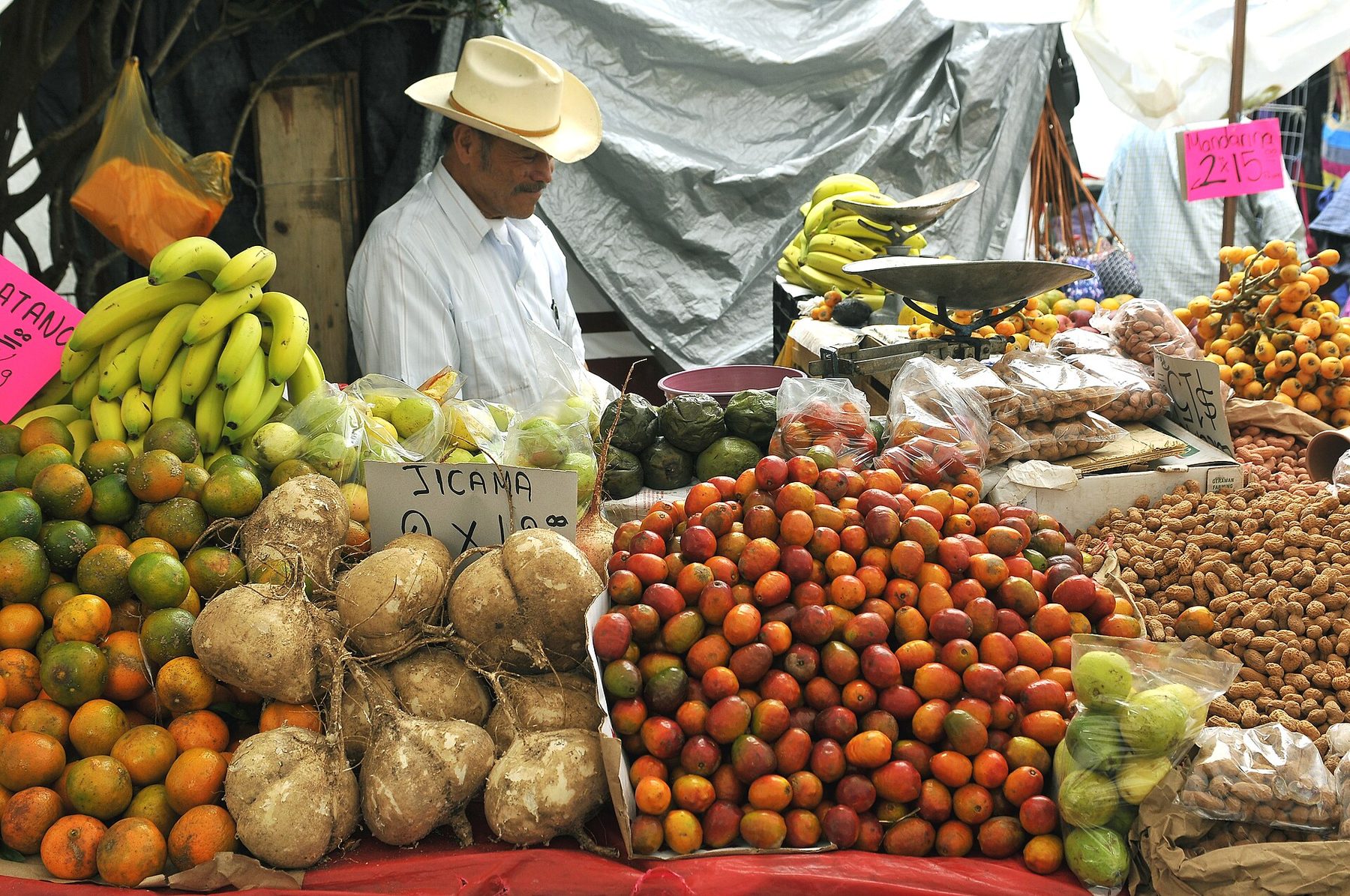 Mexican food market with fresh produce and local vendors