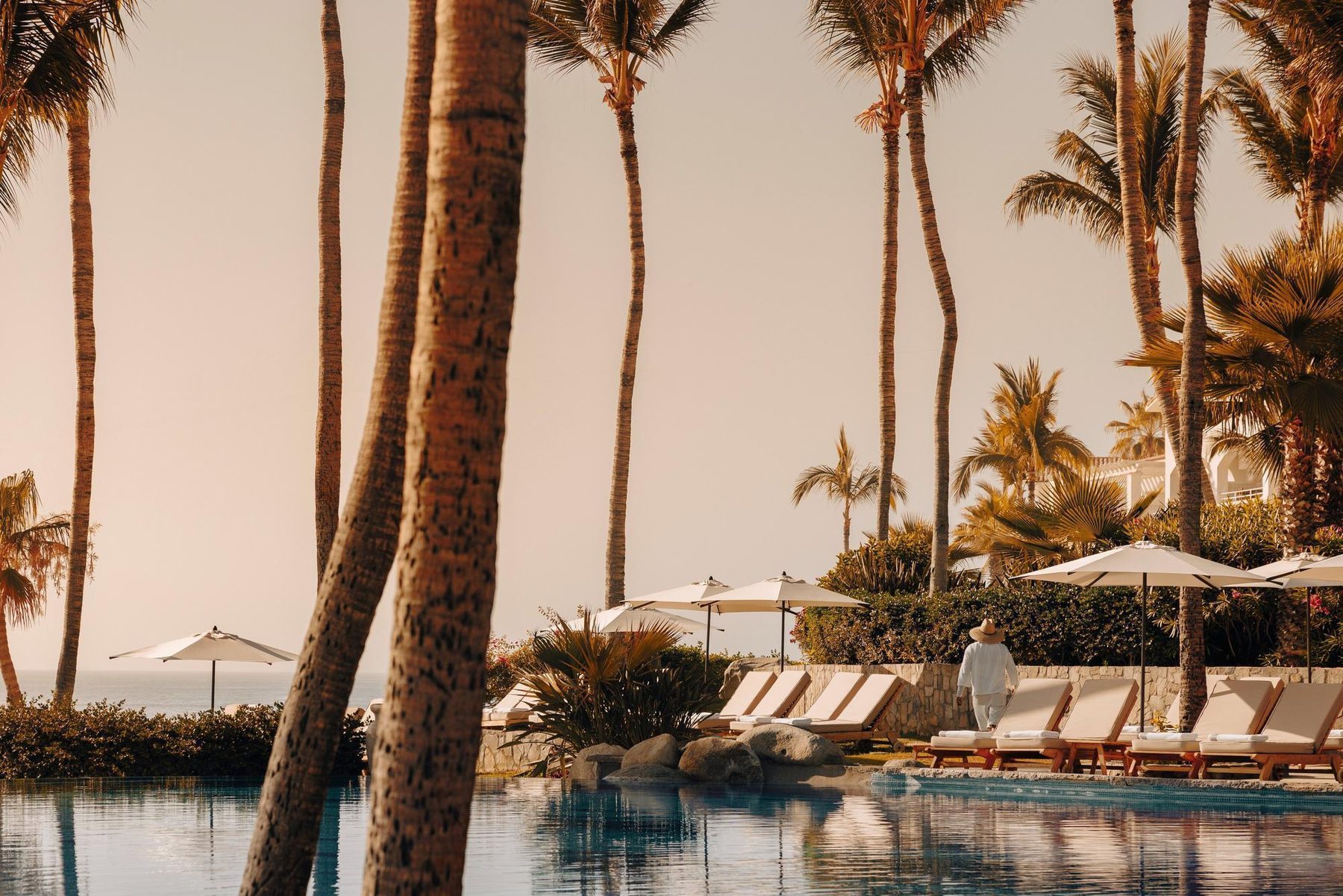 One and Only Palmilla resort on the Sea of Cortez with palapas and beachfront views