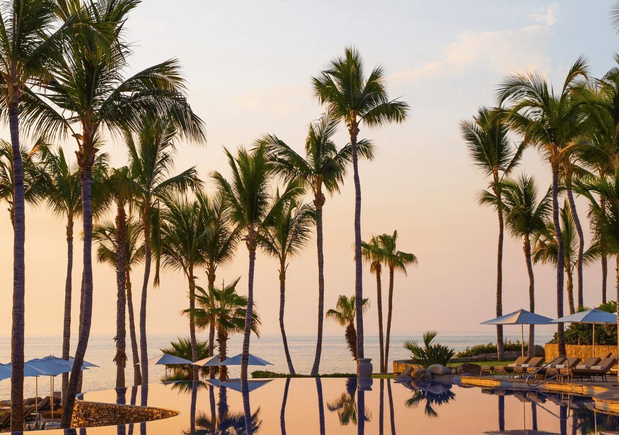 Luxury Palmilla villa infinity pool overlooking the Sea of Cortez at sunset in Los Cabos