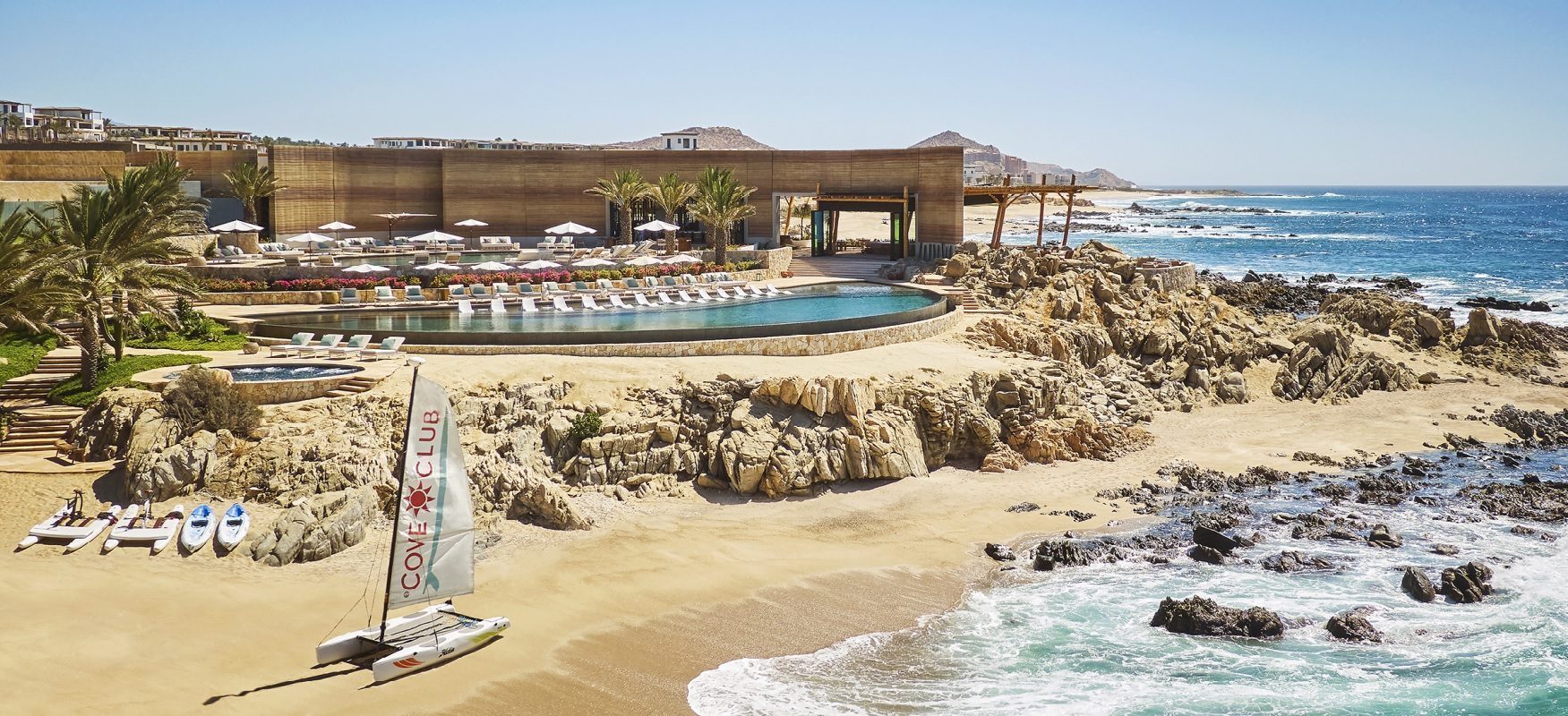 Luxury Cabo Del Sol resort lifestyle with infinity pool overlooking Sea of Cortez
