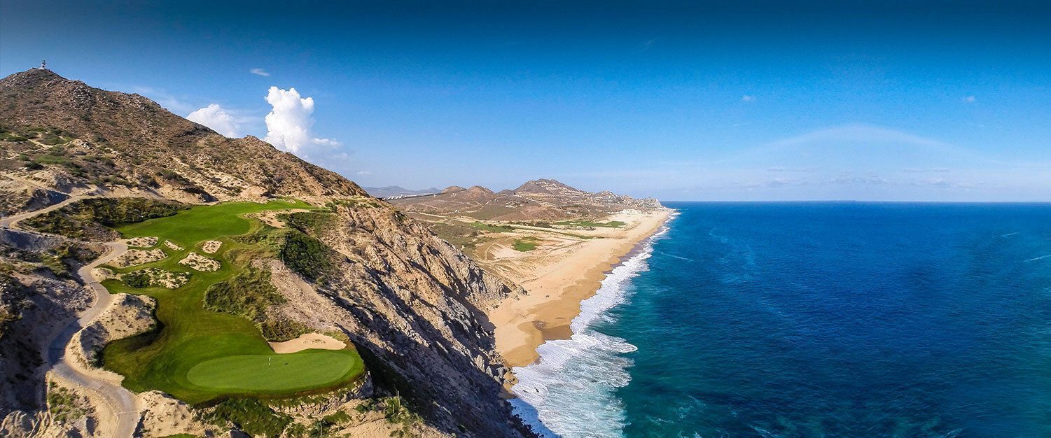 Quivira Cabo San Lucas Pacific coastline aerial view with golf course and Pueblo Bonito resorts