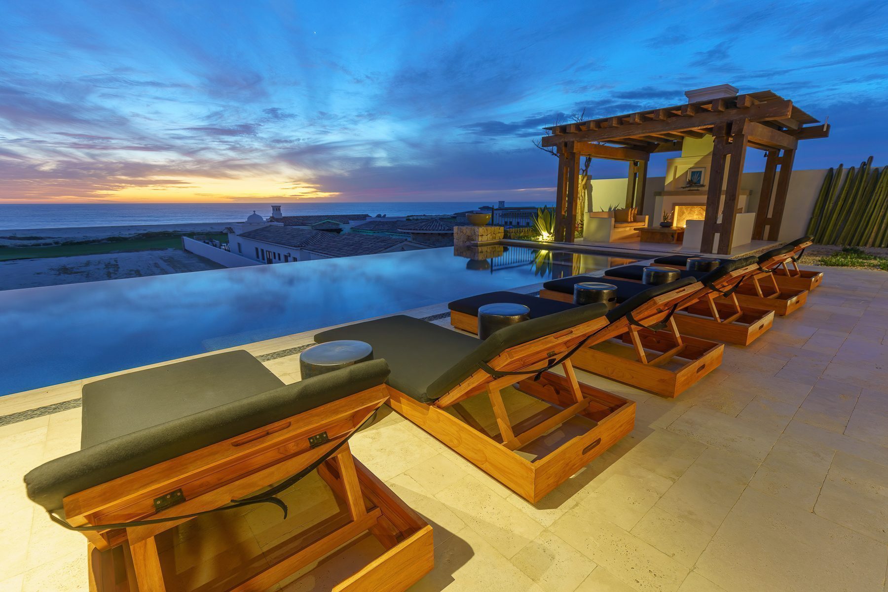 Luxury villa interior at Rancho San Lucas showing open-plan living with Pacific Ocean views