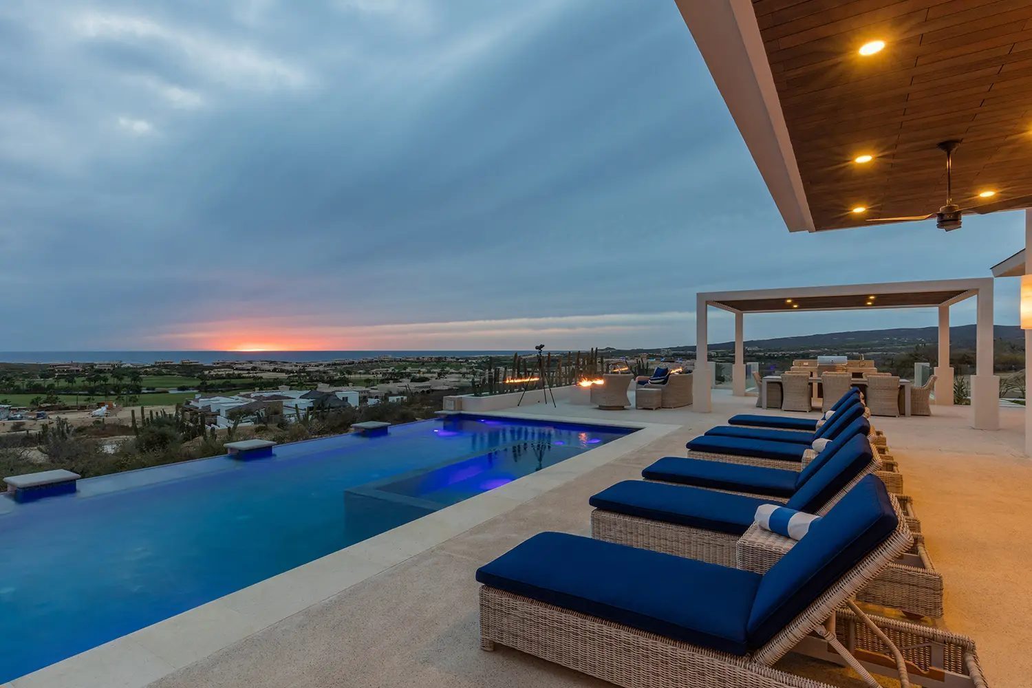 Terrace and infinity pool at Diamante Sunset Hill Estates overlooking the community at sunset