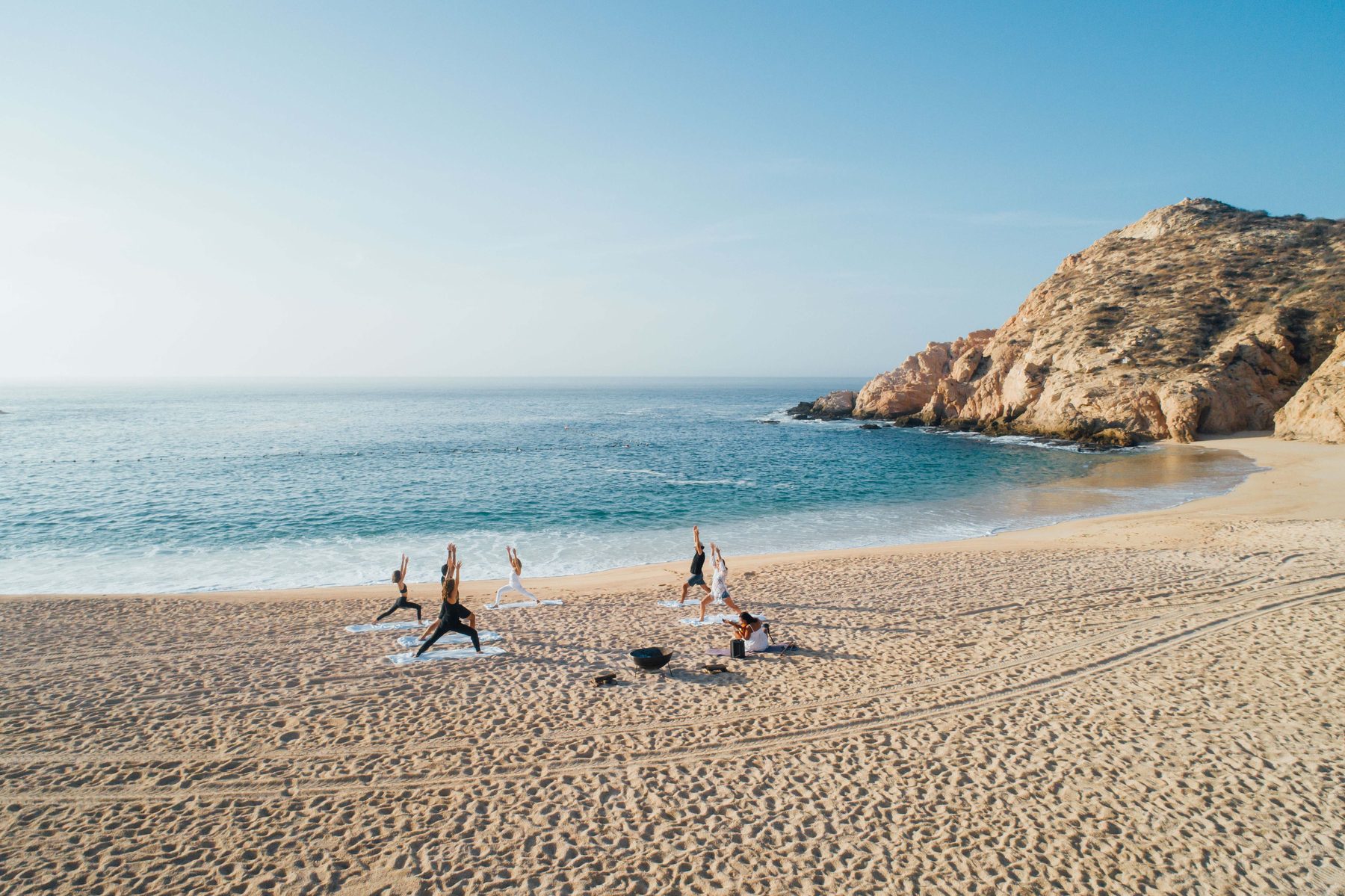Outdoor yoga retreat with ocean views in Los Cabos