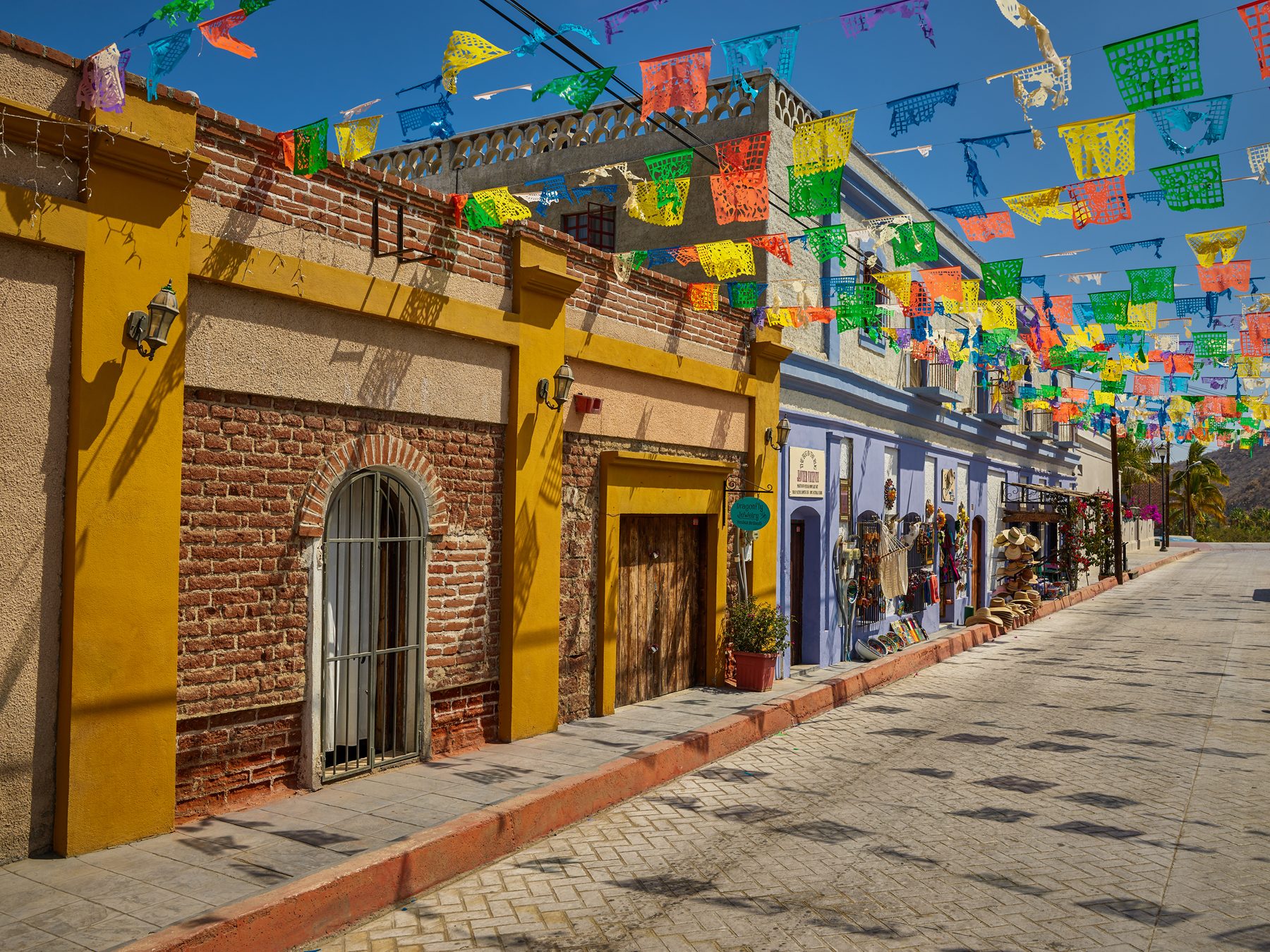 A cobbled colonial street in Todos Santos